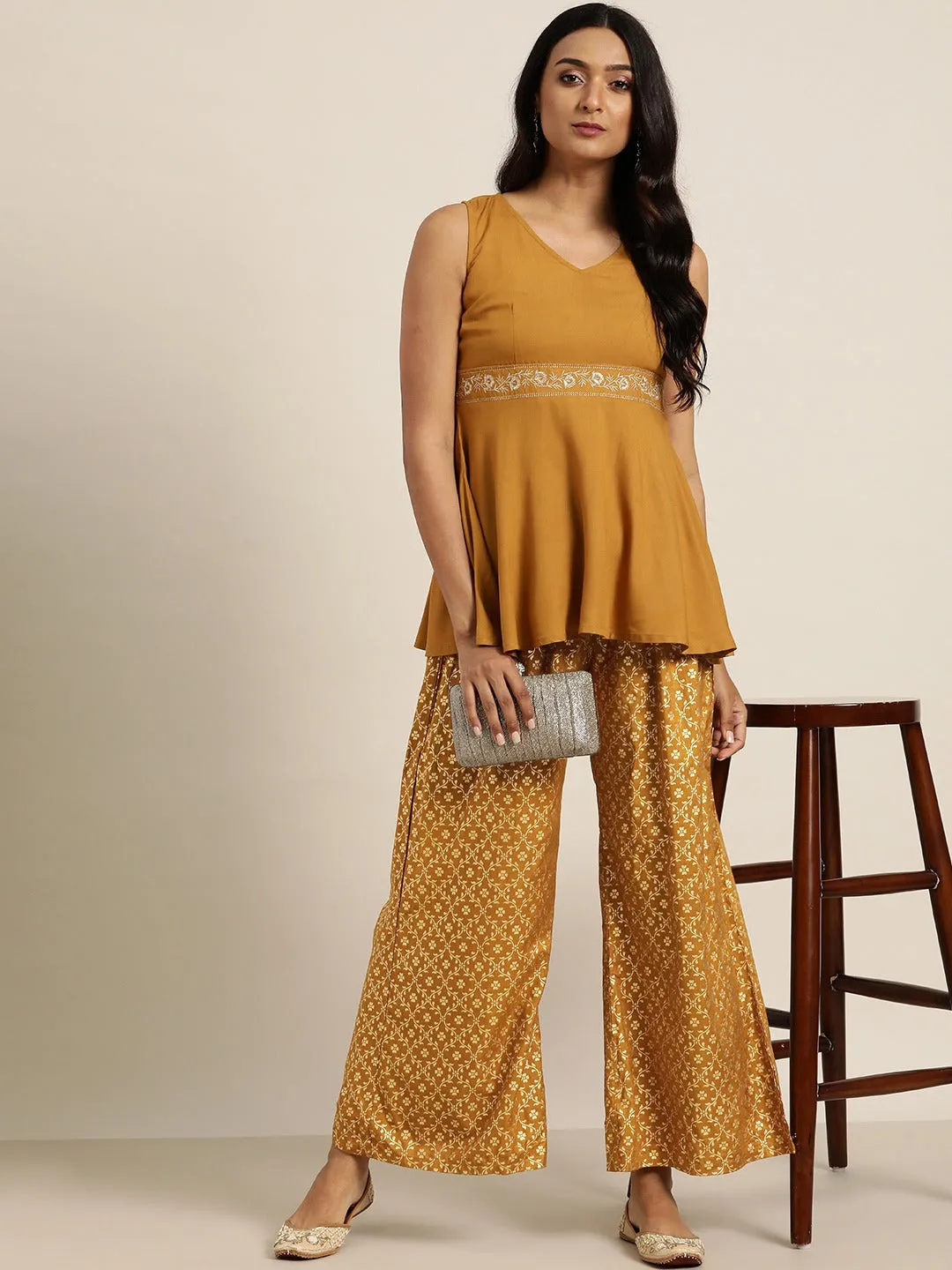 Women Mustard Foil Print Flared Liva Pants